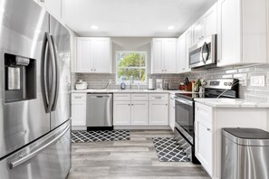 Fridge, microwave, oven, stovetop - Cozy 3BR 2 Bath Home! with Hot Tub! Located Close to the beaches and DTSP (Largo)