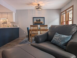 Smart TV, fireplace, books, printers