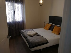 2 dormitorios, tabla de planchar con plancha, wifi y ropa de cama