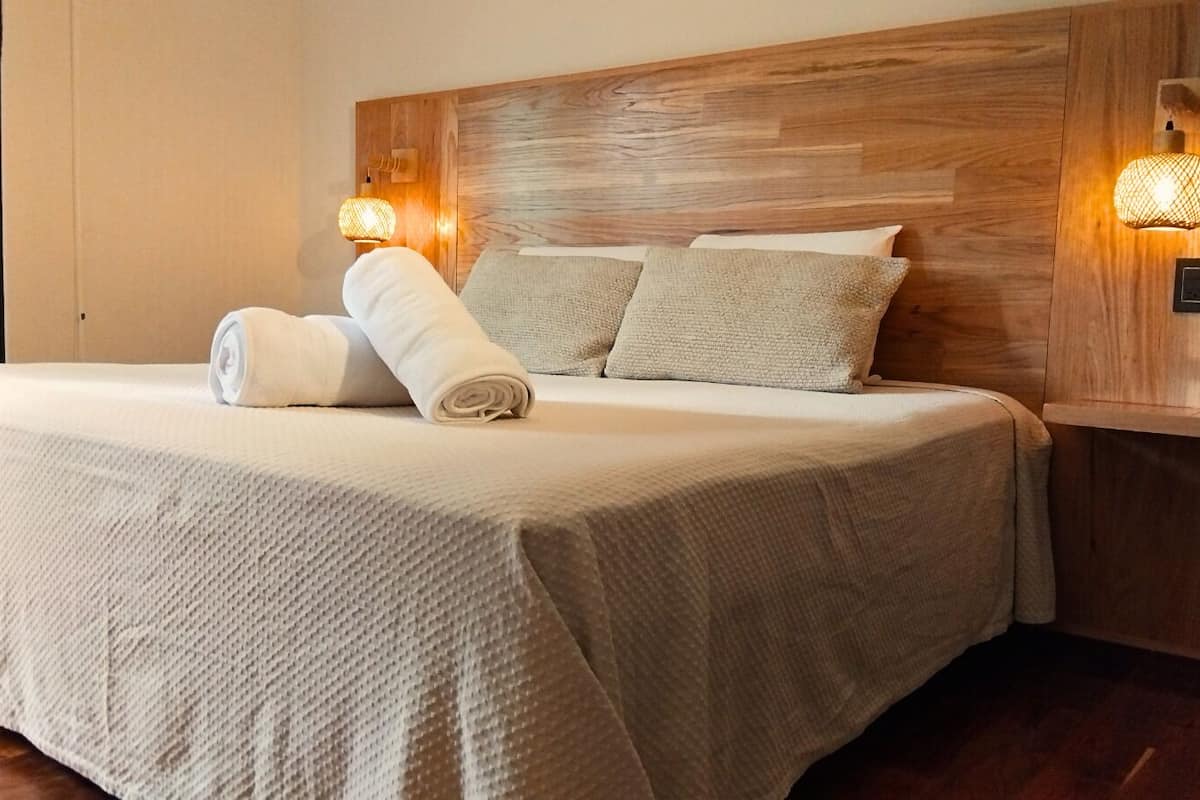 Luxury Room | Premium bedding, desk, laptop workspace, blackout drapes