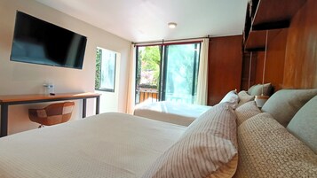 Family Room | Premium bedding, individually decorated, individually furnished, desk