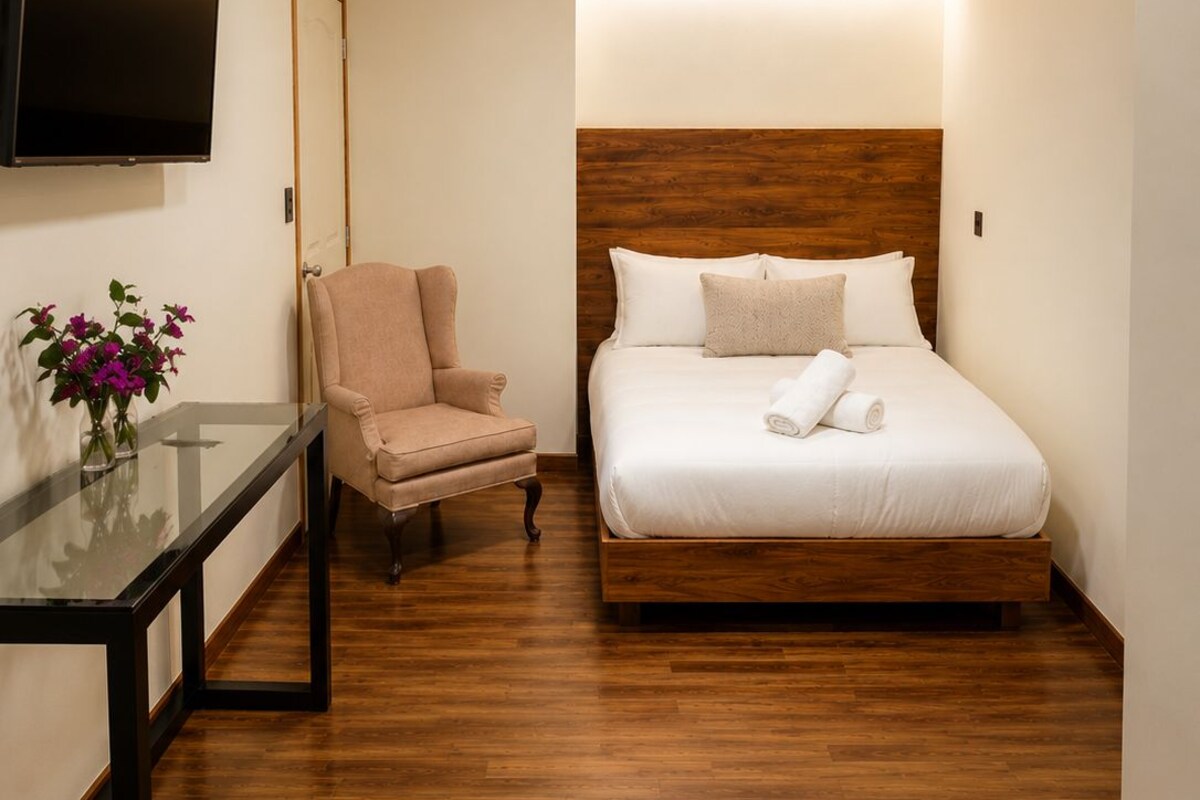 Junior Room | Premium bedding, desk, laptop workspace, blackout drapes