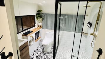 Hair dryer, towels, soap, shampoo