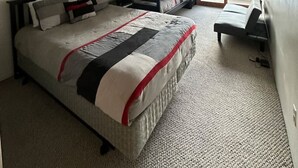 A bedroom with a bed, a desk, and a bunk bed. - Vail Home/Hot Tub On Bus Line (Vail)