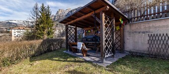 Apartment 'Tesero Margherita' with Mountain View, Shared Garden and Wi-Fi