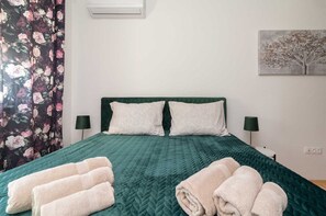 2 quartos, berço de viagem, Wi-Fi de cortesia, roupa de cama