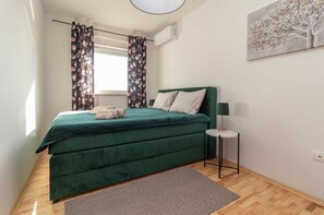2 camere, culla da viaggio, Wi-Fi gratuito, lenzuola