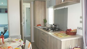 Fridge, stovetop, coffee/tea maker, high chair