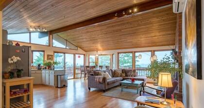 Tabor Hillside Retreat over the trees, walk to trails, and Montavilla cafes.