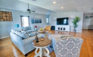 Living area - Fun in the Sun, Cargo Lift, Pool table, and private sunset view. (Bolivar Peninsula)