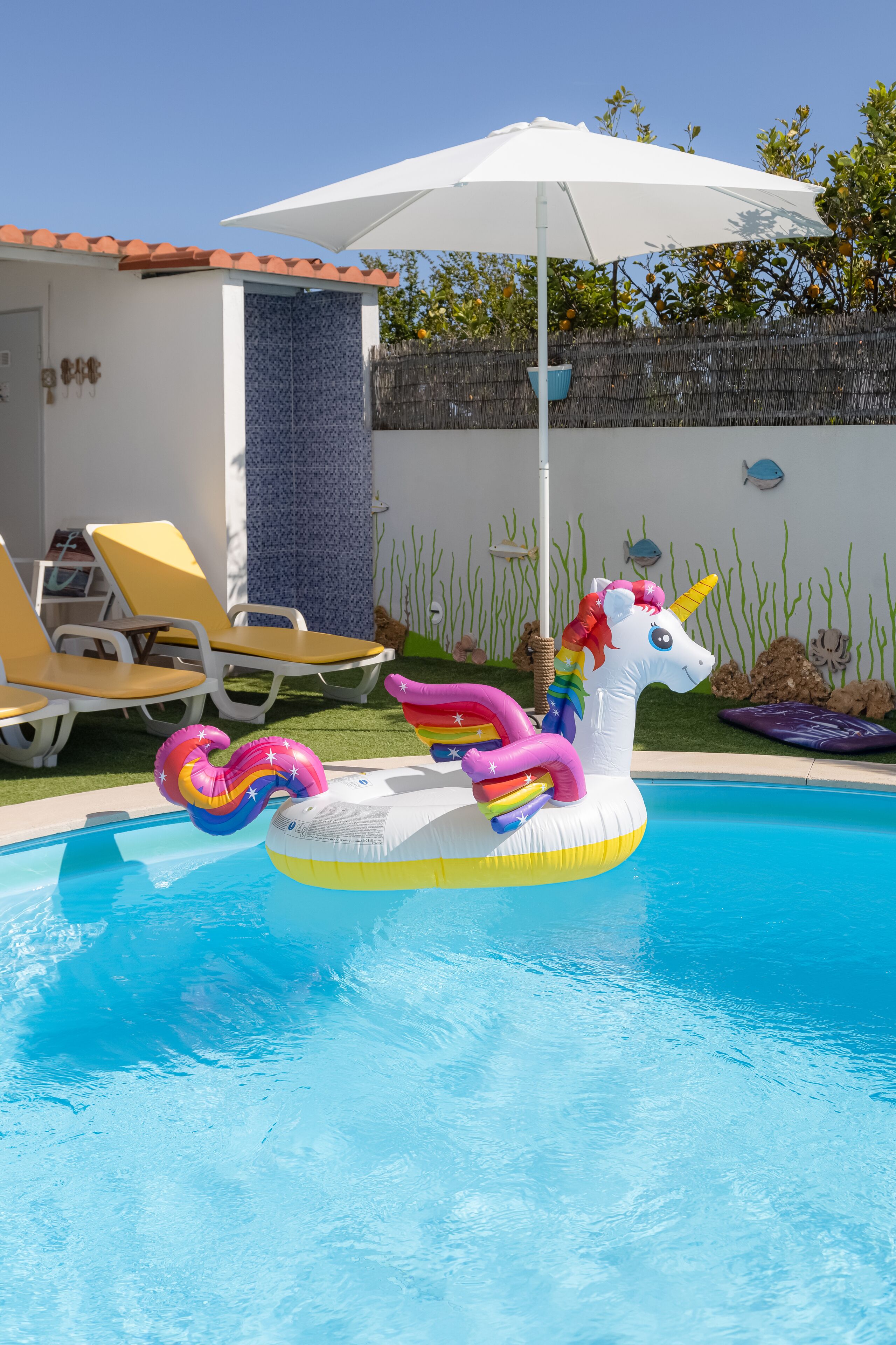 Outdoor pool, open 8:00 AM to 10:00 PM, pool umbrellas, sun loungers