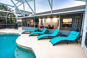 Outdoor pool, a heated pool - Sunshine Villa:3BR Home with Sparkling Heated Pool/Huge Backyard (Davenport)