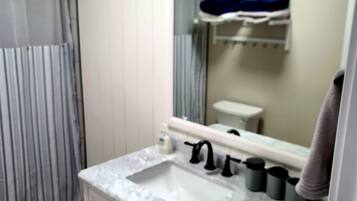 Hair dryer, towels, soap, shampoo