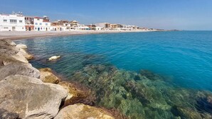 A coastal town with buildings along the shore, clear blue water, and rocky shoreline. - 2 bedroom nice apartment in Moncofa (Moncofa)