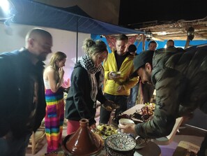 Outdoor dining - Sun, Sand, and Moroccan Hospitality –Freebirds Hostel, Moroccan Charm 7Mins Away (Agadir)