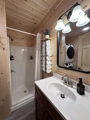 Shower, hair dryer, towels