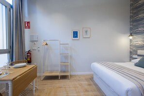1 dormitori, planxa i posts de planxar, wifi gratuïta i roba de llit 
