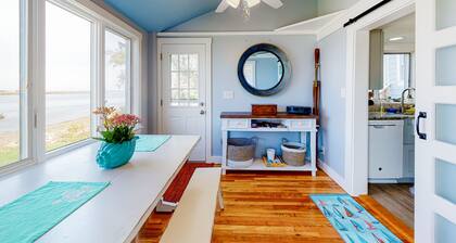 Dreamy escape on the water with rocky beach,fire pit and outdoor seating