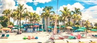 Welcome to White Sands Getaway just 50 steps to a beach Paradise! Sunset views!