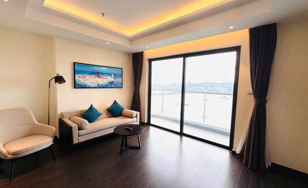 Basic Apartment | Living area | 50-inch flat-screen TV with cable channels, Netflix, streaming services