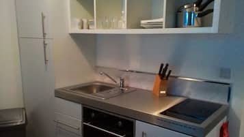 Fridge, microwave, toaster, cookware/dishes/utensils