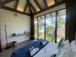 Habitación Deluxe doble, vistas al mar | 1 dormitorio, sábanas de algodón egipcio, ropa de cama de alta calidad