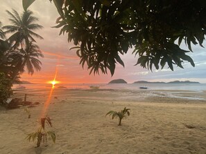 On the beach, white sand, free beach cabanas, sun-loungers