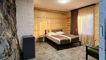 Chambre Familiale, 1 lit double et 1 canapé-lit | Coffres-forts dans les chambres