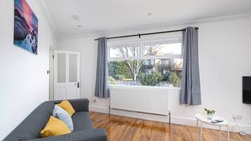 Apartment, 4 Bedrooms | Living area