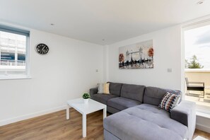 Apartment, 4 Bedrooms | Living area