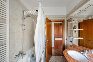 Hair dryer, bidet, towels, toilet paper