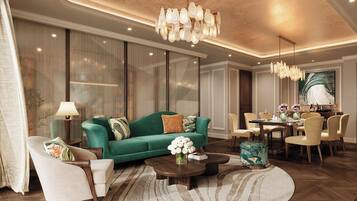 Presidential Suite | Living area | 50-inch LED TV with cable channels, fireplace