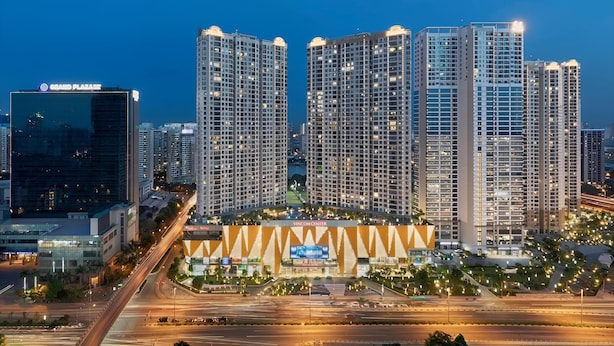 A high-rise building complex with multiple residential towers and a commercial building labeled "Grand Plaza". - Vinhomes D'Capitale Ha Noi-Gem Apartment (Hanoi)