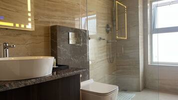 Deluxe Double or Twin Room | Bathroom | Hair dryer, slippers, towels, soap