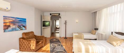 Habitación familiar | Sistema de insonorización, wifi gratis, ropa de cama