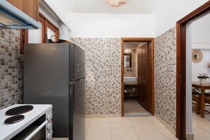 Casa Confort | Cocina privada | Frigorífico, microondas, hervidor eléctrico y tostadora