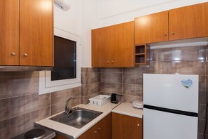 Apartment | Private kitchen | Full-sized fridge, microwave, toaster, cookware/dishes/utensils - City Center Simple Apartment Stay (Athens)
