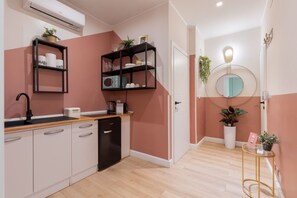 Fridge, microwave, stovetop, coffee/tea maker