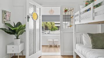 3 bedrooms, desk, iron/ironing board, travel cot