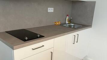 Comfort Apartment | Private kitchen | Mini-fridge, microwave, freezer