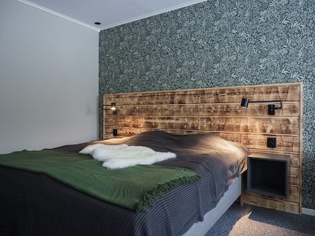 Ropa de cama de alta calidad, cortinas blackout y insonorización