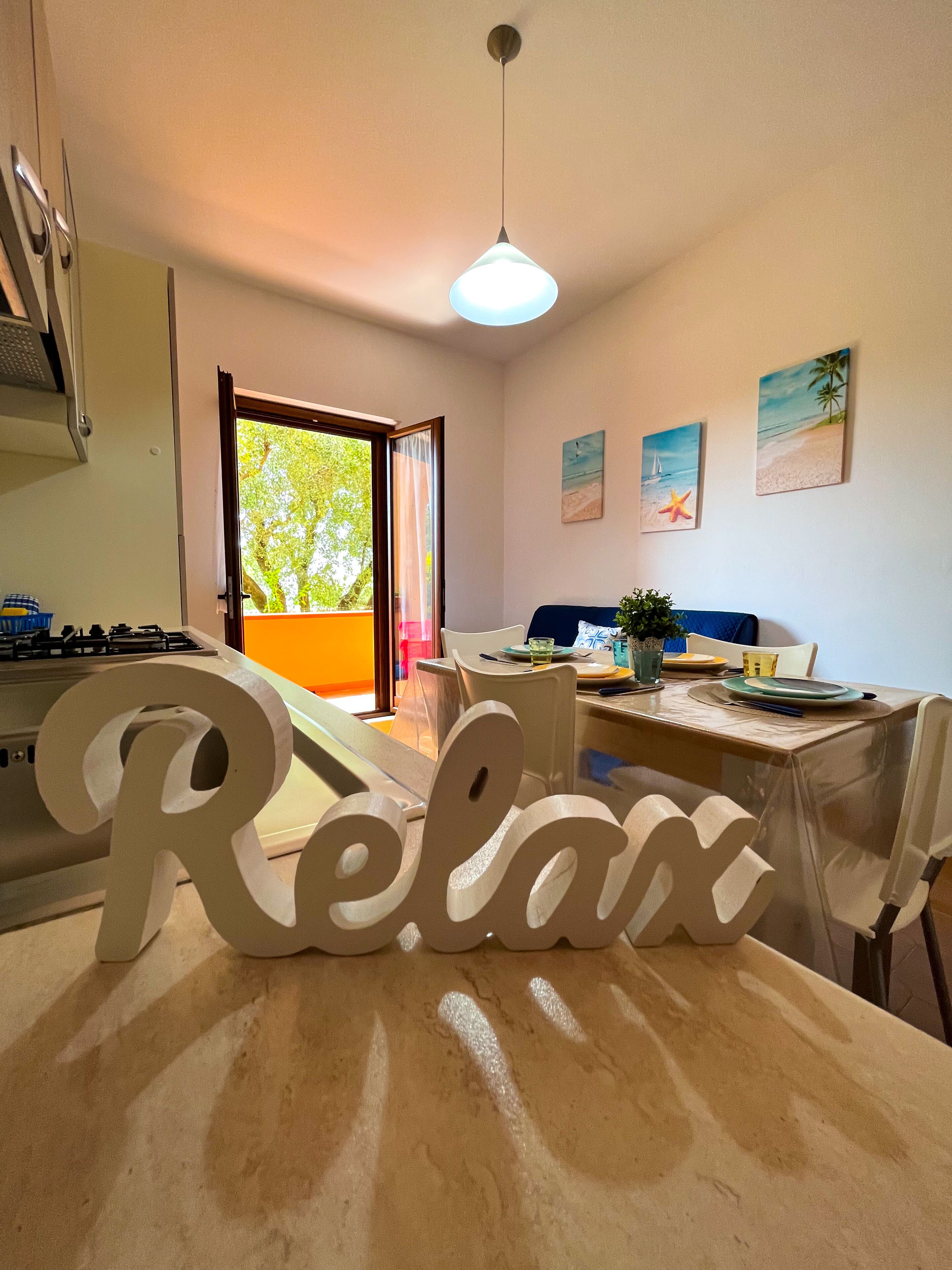 Apartamento família | Área de estar | TV de tela plana