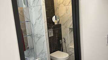 Hair dryer, towels, toilet paper