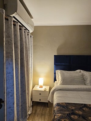 2 habitaciones, tabla de planchar con plancha, wifi y ropa de cama 
