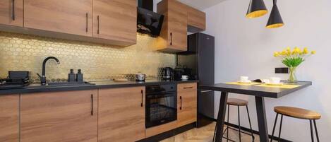 Réfrigérateur, four, plaque de cuisson, lave-vaisselle