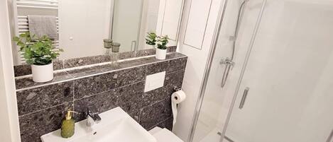 Hair dryer, towels, soap, toilet paper