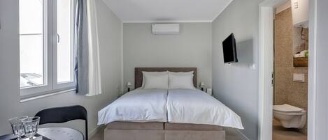 1 chambre, fer et planche Ă repasser, Wi-Fi, draps fournis