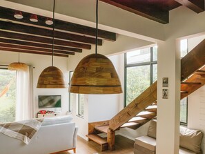 Honeymoon House, Patio, Lagoon View | Living area | 33-inch Smart TV with digital channels, Netflix, pay movies - Casa Elua - Ibiraquera - SC (Imbituba)