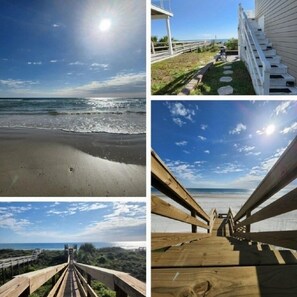 Un paseo marítimo de madera que conduce a una playa, con vista despejada al océano.