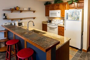 Condo, 1 Bedroom | Private kitchen | Fridge, oven, coffee/tea maker, toaster - 3402 - One Bedroom + Den Deluxe Powderhorn Lodge 1 Condo by RedAwning (Salt Lake City)